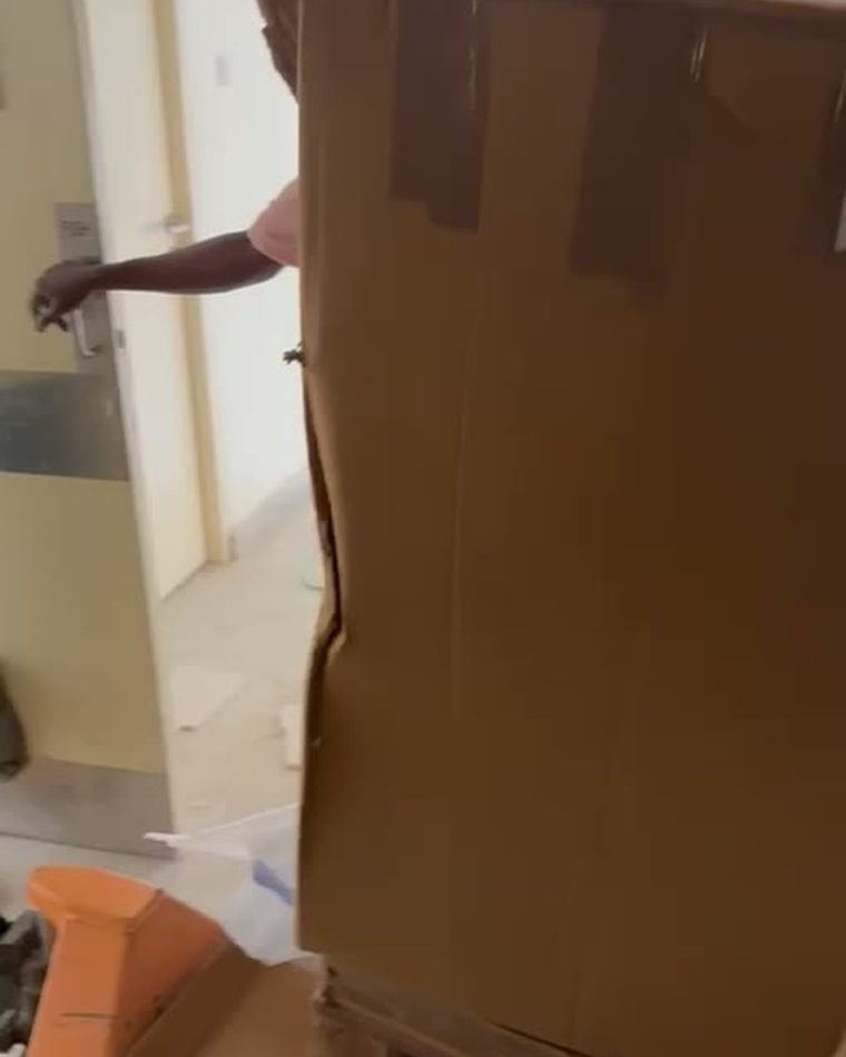 Crated equipment arriving at a hospital entrance